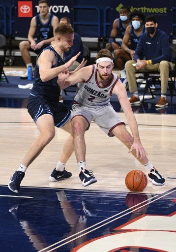 SPOKANE, WA - FEBRUARY 20: Gonzaga forward Drew Timme (2) works against San Diego forward Yauhen Massalski (25) during the game between the San Diego Toreros and the Gonzaga Bulldogs played at the McCarthey Athletic Center on February 20, 2021 in Spokane, Washington. (Photo by Robert Johnson\/Icon Sportswire