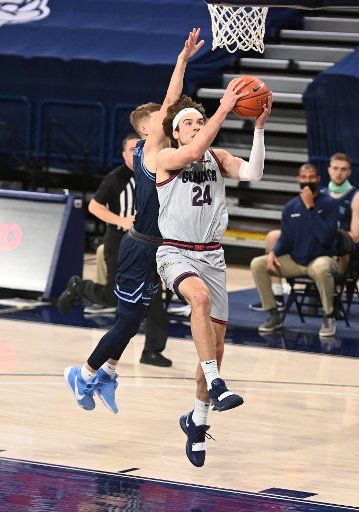 SPOKANE, WA - FEBRUARY 20: Gonzaga forward Corey Kispert (24) goes up to score during the game between the San Diego Toreros and the Gonzaga Bulldogs played at the McCarthey Athletic Center on February 20, 2021 in Spokane, Washington. (Photo by Robert Johnson\/Icon Sportswire