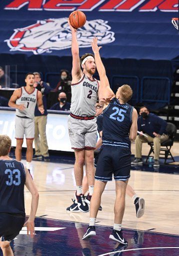 SPOKANE, WA - FEBRUARY 20: Gonzaga forward Drew Timme (2) scores over San Diego forward Yauhen Massalski (25) during the game between the San Diego Toreros and the Gonzaga Bulldogs played at the McCarthey Athletic Center on February 20, 2021 in Spokane, Washington. (Photo by Robert Johnson\/Icon Sportswire