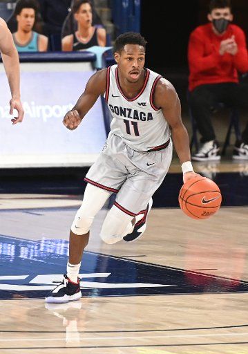SPOKANE, WA - FEBRUARY 20: Gonzaga Gonzagaard Joel Ayayi (11) heads up court with the ball during the game between the San Diego Toreros and the Gonzaga Bulldogs played at the McCarthey Athletic Center on February 20, 2021 in Spokane, Washington. (Photo by Robert Johnson\/Icon Sportswire