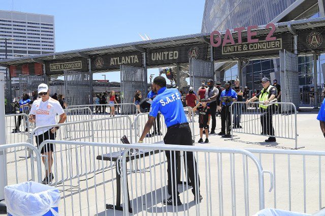 ATLANTA, GA - JUNE 19: Fans enter through security check gates prior to the Sunday afternoon MLS match between Atlanta United FC and Inter Miami CF on June 19, 2022 at the Mercedes-Benz Stadium in Atlanta, Georgia. (Photo by David J. Griffin\/Icon Sportswire