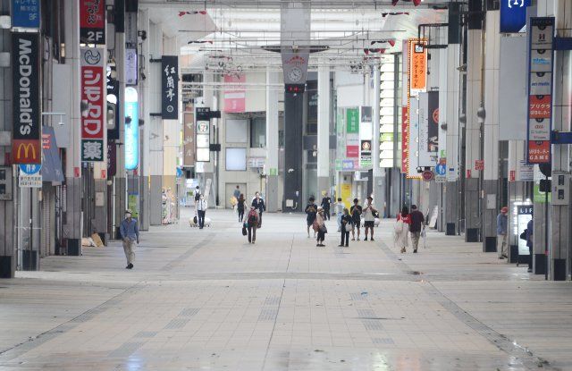 A shopping arcade is nearly empty after most stores closed temporarily due to the effect of powerful Typhoon Nanmadol, in the city of Kumamoto, southwestern Japan, Sunday, Sept. 18, 2022. Japan\