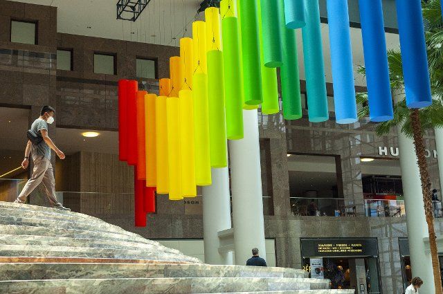 In celebration of Pride Week visitors view the installation âRadianceâ in Brookfield Place in New York on Saturday, June 19, 2021. (Â Richard B. Levine