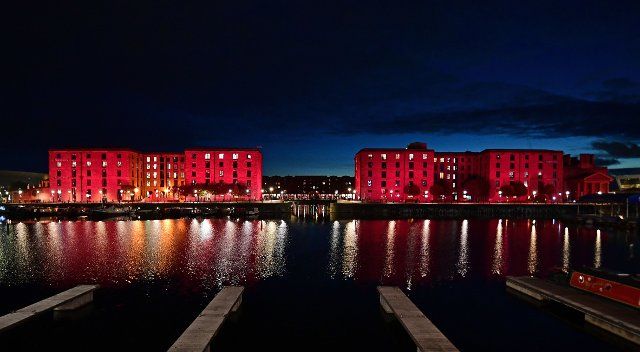 Royal Albert Dock, Liverpool colour washed and column lights turned off folling the death of Queen Elizabeth II. 19th September 2022