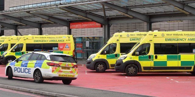 NHS Birmingham, Monday 31st October 2022. Ambulances from West Midland Ambulance Service parked up outside the Accident and Emergency department entrance of the Queen Elizabeth Hospital, Selly Oak, Birmingham this afternoon taken at 1pm