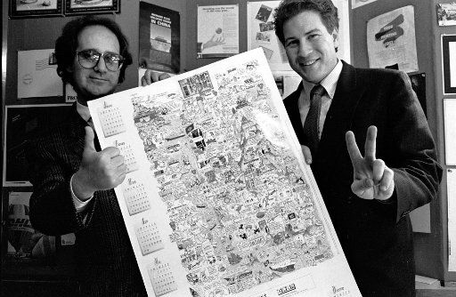 Mr Philip Rosenberg (left) and Mr Baden Gilmore of Great Wall Graphics posing with their award winning poster.