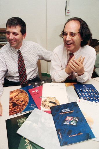 Mr Paul Zimmerman (left), Managing Director of design company The Bridge, and Mr Philip Rosenberg, Managing Director of Great Wall Graphics, talk about their plans after the merger of the two companies. The deal, arranged in August after two ...