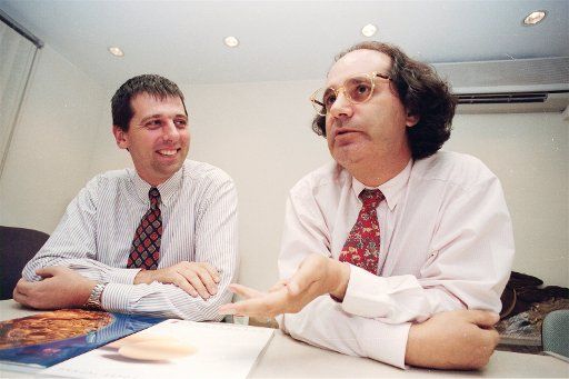 United...Mr Paul Zimmerman (left), Managing Director of design company The Bridge, and Mr Philip Rosenberg, Managing Director of Great Wall Graphics, have a chat about their plans after the merger of the two design companies. The deal, arranged in ...