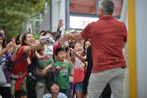 Cesar Millan, a Mexican American dog trainer, is asked for autographs by fans in Stanley Plaza. Millan is a self-taught dog expert and is widely known for his television series Dog Whisperer with Cesar Millan. Millan was talking about dog behaviour ...