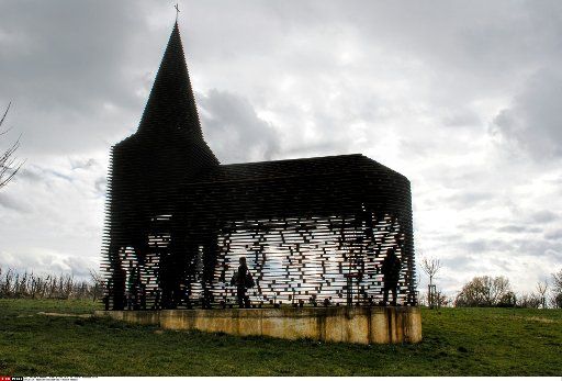 Photo taken on April 3, 2016 shows a "see-through church", a site specific work entitled "Reading between the lines" outside Belgian town of Borgloon. Completed in 2011 by the Belgian architects duo Gijs Van Vaerenbergh, the project is 10 meters ...