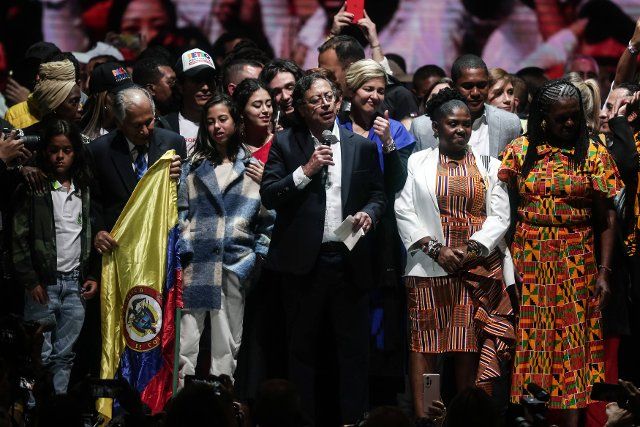(220620) -- BOGOTA, June 20, 2022 (Xinhua) -- Gustavo Petro (C), presidential candidate of the leftist Historic Pact for Colombia coalition, celebrates with his running mate Francia Marquez (5th L front) after winning the Colombian presidential elections in Bogota, Colombia, June 19, 2022. Gustavo Petro was elected president of Colombia on Sunday after defeating independent candidate Rodolfo Hernandez in the second round of elections in a very close race, the state-run National Civil Registry reported. (Photo by Jhon Heaver Paz\/Xinhua) - Jhon Heaver Paz -\/\/CHINENOUVELLE_XxjpbeE007259_20220620_PEPFN0A001\/2206201054\/Credit:CHINE NOUVELLE\/SIPA