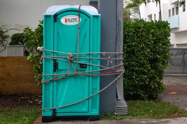 (220928) -- MIAMI, Sept. 28, 2022 (Xinhua) -- A portable toilet is roped to a concrete post in Miami, Florida, the United States, Sept. 27, 2022. A hurricane warning has been extended southward on the west coast of the U.S. state of Florida to Chokoloskee, forecasters said Tuesday evening. (Photo by Monica McGivern\/Xinhua) - Monica McGivern -\/\/CHINENOUVELLE_XxjpbeE007139_20220928_PEPFN0A001\/2209281004\/Credit:CHINE NOUVELLE\/SIPA