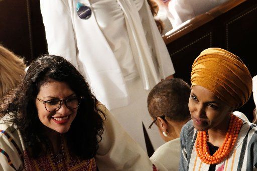 United States Representative Rashida Tlaib, a Democrat from Michigan, (left) and Representative Ilhan Omar, a Democrat from Minnesota, are seen before the 2020 State of the Union Address on Capitol Hill on February 4, 2020. Credit: Alex Wroblewski\/ CNP\/AdMedia\/\/Z-ADMEDIA_adm_020420_Trump_SOTU_CNP_080\/2002050502\/Credit:Alex Wroblewski\/CNP\/AdMed\/SIPA\/
