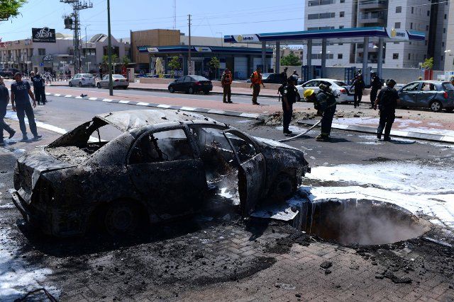 (210518) -- GAZA\/JERUSALEM, May 18, 2021 (Xinhua) -- A burnt car is seen after a rocket from the Gaza Strip landed in southern Israeli city of Ashkelon, on May 11, 2021. (Tomer Neuberg\/JINI via Xinhua) - Tomer Neuberg -\/\/CHINENOUVELLE_16190020\/2105181714\/Credit:CHINE NOUVELLE\/SIPA
