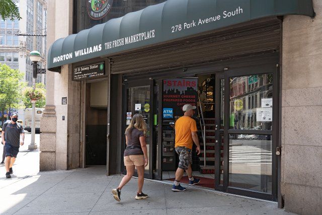Shoppers enter a Morton Williams supermarket in Manhattan in New York City. The Big Apple supermarket chain Morton Williams has decided to severely curb its sales and marketing of Ben & Jerry ice cream after the popular brand took sides in a long-running Middle East controversy. Ben & Jerry\