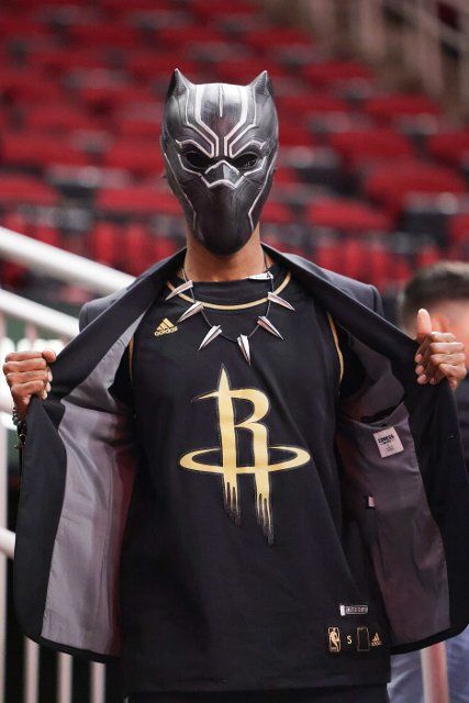 Houston Rockets vs Oklahoma City Thunder A fan wearing "Black Panther" mask during the Wakanda Forever theme night of the matchup between Houston Rockets and the Oklahoma City Thunder at Toyota Center in Houston Texas. Gia Quilap\/Sports Press Photo (Photo by \/Sipa USA