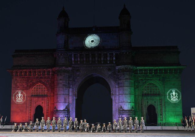 Indian Navy personnel holding guns perform drill near Gateway of India in Mumbai. The Beating Retreat and Tattoo ceremony by Indian Navy is performed as part of Navy week celebration in Mumbai. (Photo by Ashish Vaishnav \/ SOPA Images\/Sipa USA