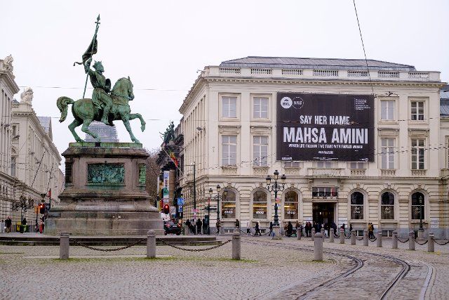 Inscription in memory of Mahsa Amini on the Oldmasters museum on the Place Royale with the equestrian statue of Godefroy de Bouillon. The death of Masha Amini in Iran has sparked protests for women\
