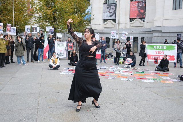 Artist Erika Suarez performs during a protest to demand freedom in Iran and against the death of Iranian woman Mahsa Amini who was arrested on September 13 in the capital Tehran at Cibles square in Madrid. (Photo by Atilano Garcia \/ SOPA Images\/Sipa USA