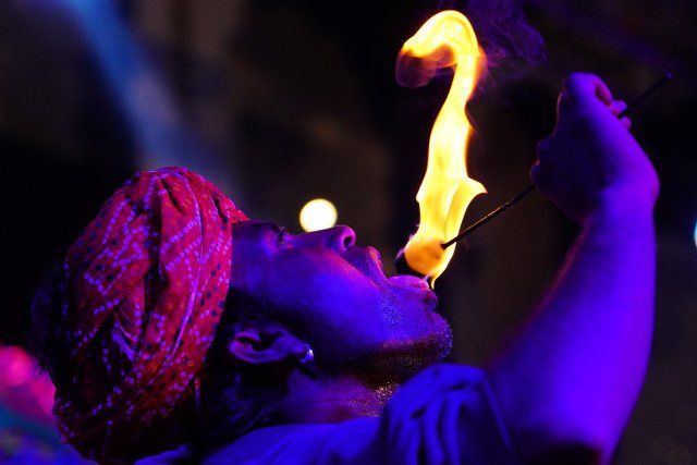 A man performing a fire breathing stunt in Pushkar, India on December 4, 2022. Photo by Abaca\/Sipa