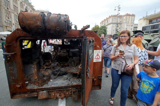 People look at the destroyed russian military equipment displayed at the exhibition dedicated to the Independence Day of Ukraine on Khreshchatyk Street, Kyiv, capital of Ukraine, August 20, 2022. Photo by Pavlo Bahmut\/Ukrinform\/Abaca\/Sipa