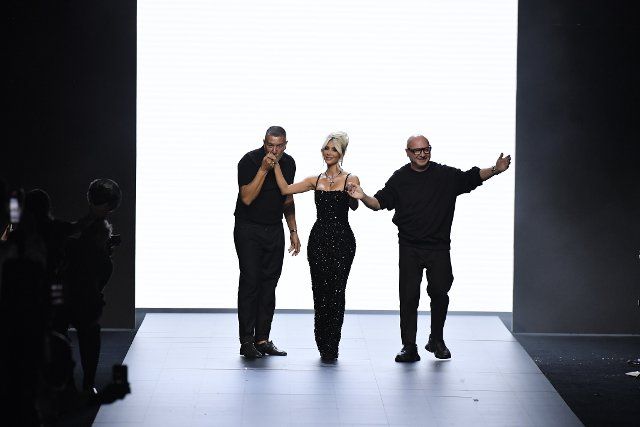 Kim Kardashian with designers Domenico Dolce and Stefano Gabbana on the runway at the Dolce Gabbana fashion show during the Spring Summer 2023 Collections Fashion Show at Milan Fashion Week in Milano on September 24 2022. (Photo by Jonas Gustavsson\/Sipa USA
