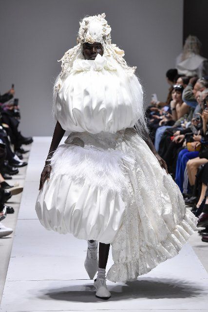 A model walks on the runway at the Commercial des Garcons fashion show during the Spring Summer 2023 Collections Fashion Show at Paris Fashion Week in Paris on October 1 2022. (Photo by Jonas Gustavsson\/Sipa USA