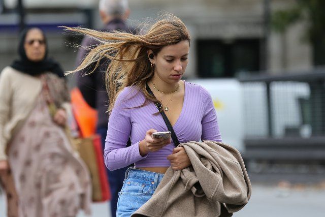 A woman seen using her mobile phone while walking outside Warren Street station in London. (Photo by Dinendra Haria \/ SOPA Images\/Sipa USA