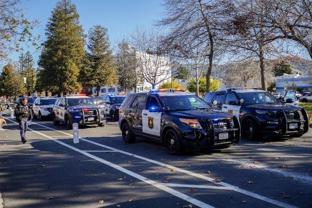 Policeman worked on the case and cop vehicles parked on the road. A traffic violation suspect was pulled over by seven cop vehicles and arrested by the Berkeley police department. (Photo by Michael Ho Wai Lee \/ SOPA Images\/Sipa USA