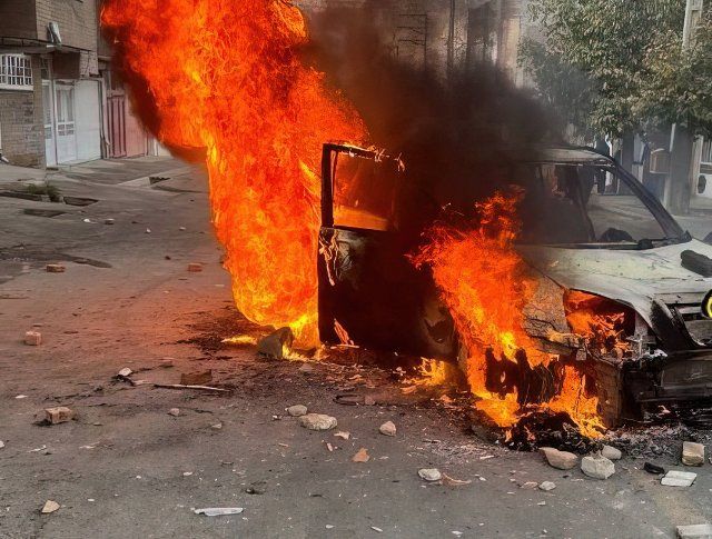 Iranian protesters attack on the police car and set on fire in Sanandaj city in the northwestern Kurdistan region, 362 people had been killed in the two-month-long protests, including 56 minors. It also reported that 56 members of the security forces had been killed, in addition to 16,033 people who were arrested. unrest continue in Iran since the murder of Mahsa Amini, Iranians have been holding daily protests anti-regime continue with intensity. Sanandaj. Iran. November 17, 2022. Photo by SalamPix\/Abaca\/Sipa