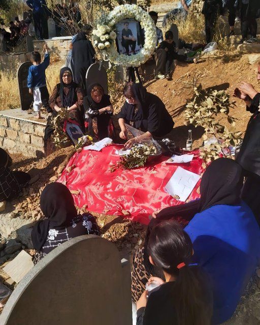 The relatives of Iranian teenager mourn at the grave, who was shot by the security forces of the Islamic Republic in Marivan city in the northwestern Kurdistan region, 362 people had been killed in the two-month-long protests, including 56 minors. It also reported that 56 members of the security forces had been killed, in addition to 16,033 people who were arrested. unrest continue in Iran since the murder of Mahsa Amini, Iranians have been holding daily protests anti-regime continue with intensity. Marivan. Iran. November 17, 2022. Photo by SalamPix\/Abaca\/Sipa