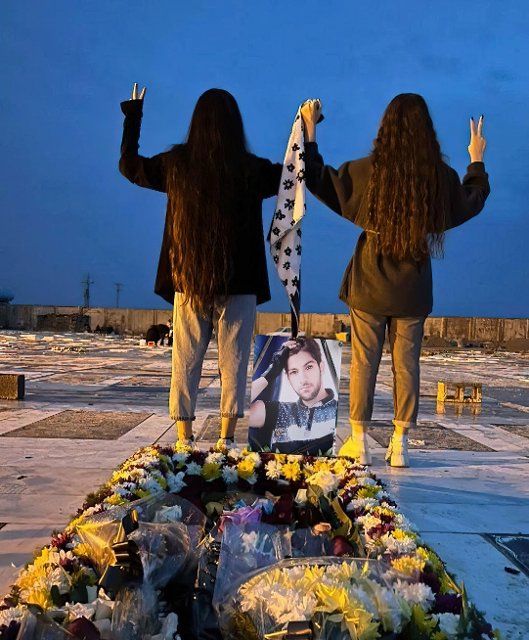 The nieces of Farzad Ansarifar, who was killed by Iranian security forces durning protest, stand on his grave without the headscarf mandatory for women in the Islamic Republic in Behbahan, unrest continue in Iran since the murder of Mahsa Amini, Iranians have been holding daily protests anti-regime continue with intensity. Behbahan. Iran. November 18, 2022. Photo by SalamPix\/Abaca\/Sipa