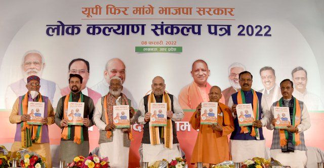LUCKNOW, INDIA - FEBRAURY 8: Home Minister Amit Shah, UP Chief Minister Yogi Adityanath, Union Minister Anurag Thakur, State BJP President Swatantra Dev Singh, Deputy Chief Ministers Keshav Prasad Maurya and Dinesh Sharma release Bharatiya Janata Party (BJP) Manifesto Lok Kalyan Sankalp during a program organised at Indira Gandhi Foundation on February 8, 2022 in Lucknow, India. The polling for seven-phase assembly elections of Uttar Pradesh will be held on February 10 to 7 March 2022 in seven phases to elect all 403 members of the Uttar Pradesh Legislative Assembly. The votes will be counted and the results will be declared on 10 March 2022. (Photo by Deepak Gupta\/Hindustan Times\/Sipa USA