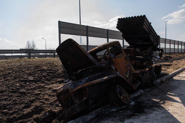 A destroyed Russian MLRS(multiple launch rocket system) vehicle can be seen next to the highway in Kyiv Oblast. Day 29 of the Russia-Ukraine war, as Ukraine continues the defence of its capital Kyiv from Russia attack. Ukraine Ministry Defense claimed they have destroyed 561 Russian tanks, as NATO says Russia may have lost 15,000 troops in just a month of the war. (Photo by Alex Chan Tsz Yuk \/ SOPA Images\/Sipa USA