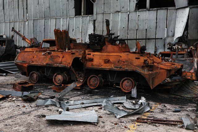 A destroyed vehicle is seen in the city liberated from the russian occupiers, Hostomel, Kyiv Region, north-central Ukraine, on April 08, 2022. Photo by Hennadii Minchenko\/Ukrinform\/Abaca\/Sipa