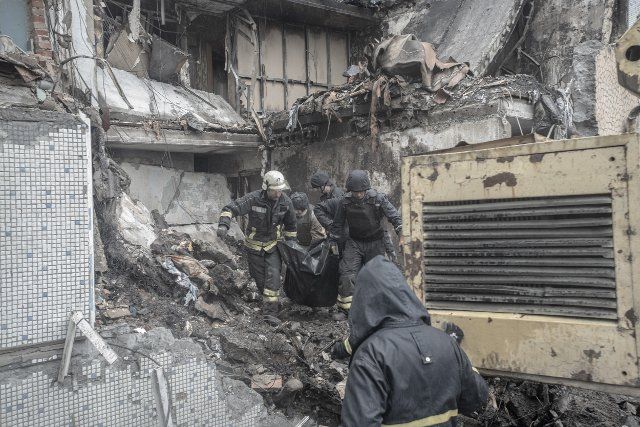 Firemen rescuing the dead bodies of a woman and his son of 1 year old in a destroyed house by a rocket launched from a russian airplane in Bakhmur, Donbas, Ukraine. Wednesday 18th of May of 2022.The Russian invasion of Ukraine by order of Vladimir Putin in February 2022 produced large displacements of people and a great reaction from public opinion and political forces around the world. Although many call it the third world war, experts say that this armed conflict (which has already caused more than 75,000 fatalities on both sides) is a new "cold war". (Photo Credit: Andoni Lubaki \/ SIPA USA