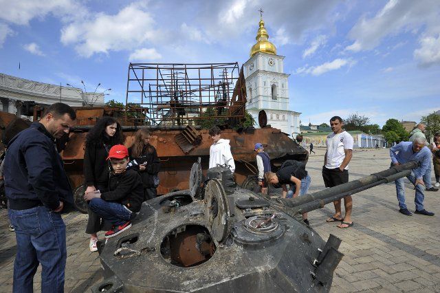 People look at the destroyed Russian military equipment in the center of Kyiv. Russia invaded Ukraine on 24 February 2022, triggering the largest military attack in Europe since World War II. (Photo by Sergei Chuzavkov \/ SOPA Images\/Sipa USA