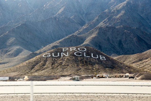 A Las Vegas shooting range advertises itself prominently on the side of a foothill that is easily seen off Highway 95 in Nevada on February 22, 2019. Pro Gun Vegas sits on 160 acres of land complete with a 5,000 square-foot clubhouse, machine gun ranges, training ranges, and target stands. (Photo by: Alexandra Buxbaum\/Sipa USA
