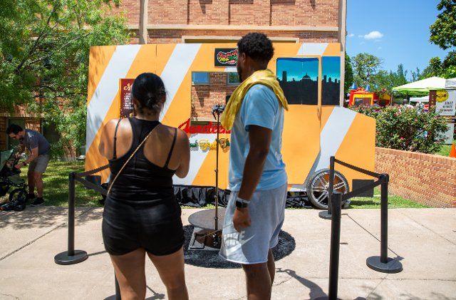 Austinites gather to celebrate Juneteenth at the Soul Food Truck Fest on Huston-Tillotson University on June 18, 2022. (Photo by Stephanie Tacy\/Sipa USA