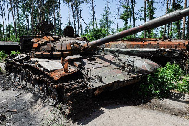 A destroyed military tank of the Russian army is seen at Dmytrivka village near the Ukrainian capital Kyiv. Russia invaded Ukraine on 24 February 2022, triggering the largest military attack in Europe since World War II. (Photo by Sergei Chuzavkov \/ SOPA Images\/Sipa USA