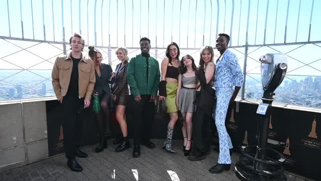 Cast members of “One Of Us Is Lying” (l-r) Cooper van Grootel, Sara Thompson, Annalisa Cochrane, Chibuikem Uche, Marianly Tejada, Melissa Collazo, Jess McLeod and Karim Diane visit The Empire State Building in New York, NY, 