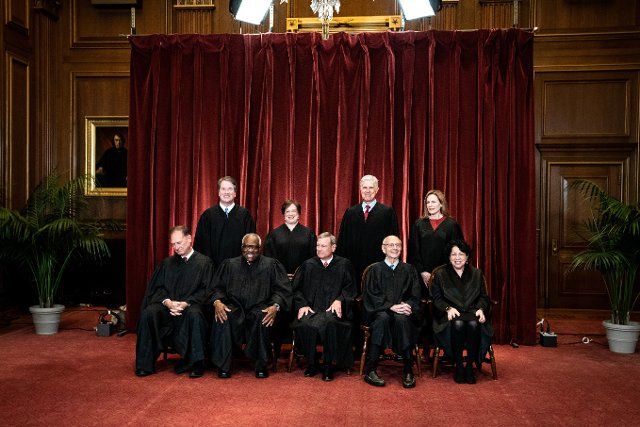 Members of the Supreme Court pose for a group photo at the Supreme Court in Washington, DC on April 23, 2021. Seated from left: Associate Justice of the Supreme Court Samuel A. Alito, Jr., Associate Justice of the Supreme Court Clarence Thomas, 