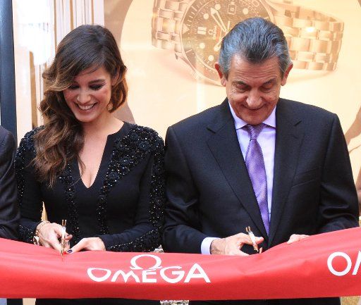 The new Bond Girl, French model and actress, Berenice Marlohe and OMEGA President Stephen Urquhart attend the opening of OMEGA\