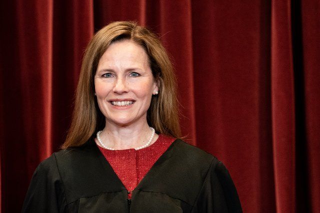 4\/23\/2021 - Washington, District of Columbia, United States of America: Associate Justice of the Supreme Court Amy Coney Barrett stands during a group photo of the Justices at the Supreme Court in Washington, DC on April 23, 2021. (Erin Schaff \/ CNP \/ Polaris