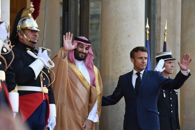July 28, 2022 - Paris, France: French president Emmanuel Macron (R) greets Saudi Arabia\