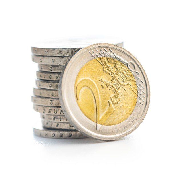 Stack of euro coins isolated on a white background.
