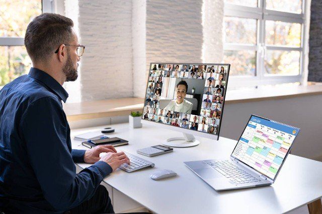 Virtual Video Conference Business Meeting On Computer