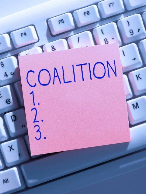 Handwriting text Coalition,  Business approach a temporary alliance of distinct parties,  persons,  or states for joint action