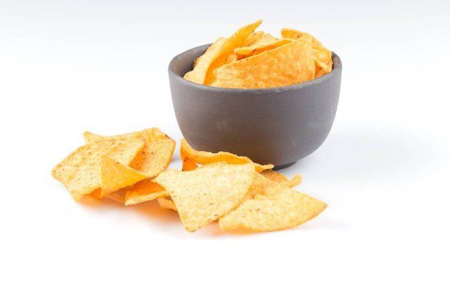 mexican corn nachos chips,  isolated on white background