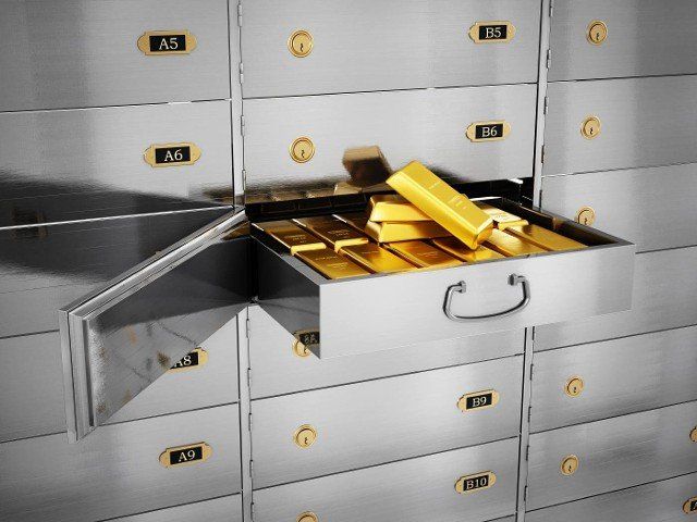 Gold ingots inside private bank deposit box. 3D illustration.